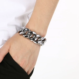 Polished silver stainless steel 25mm wide Cuban link bracelet for men on wrist