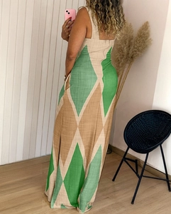 Detail of green and brown geometric pattern on sleeveless midi dress with linen texture