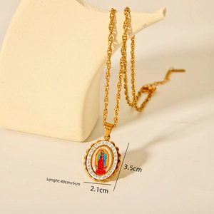 Detailed view of 18K gold Virgin Mary pendant with white crystals and chain dimensions
