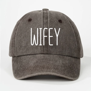 Detailed view of dark grey washed cotton baseball cap featuring white WIFEY embroidery