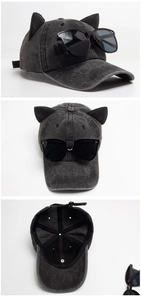 Detail of gray washed denim baseball cap with cat ears and integrated flip-up sunglasses