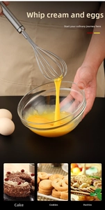 Close-up of SUS 304 stainless steel whisk mixing egg yolks for baking preparation
