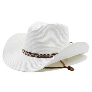Detail of white straw cowboy hat showing woven texture, studded band and adjustable chin strap