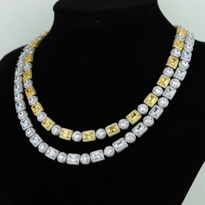 Detail of double layered 8mm round and rectangular zircon necklaces on a black bust display