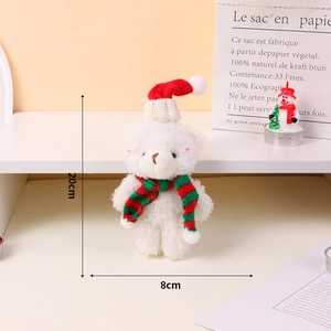 Detail shot showing a 20cm plush Christmas bear with size markings and a striped scarf