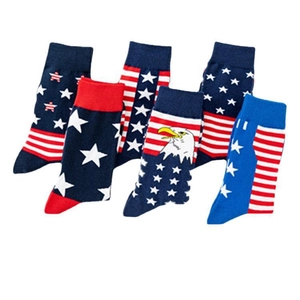 Set of 6 American flag themed cotton crew socks with eagle patterns on white background