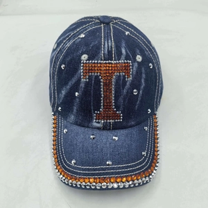 Vintage navy washed denim baseball cap with rhinestone letter T and studded brim