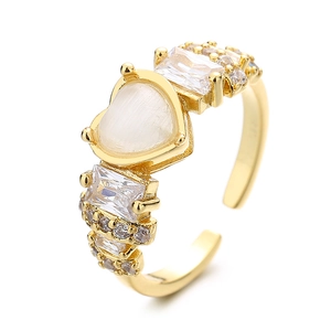 Elegant gold open ring featuring a heart-shaped opal and sparkling zircon accents