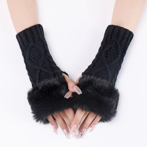 Detail of black cable knit fingerless gloves with luxurious faux fur trim and thumb hole