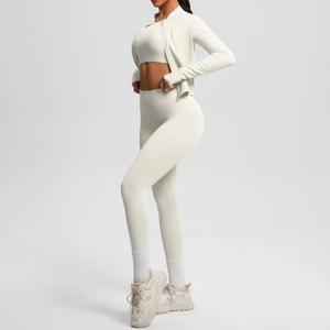 Three-piece yoga set with zip jacket, sports bra, and high waist leggings in cream white
