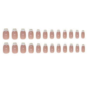 Classic white French tip press-on nails set with nude base in medium trapezoid shape