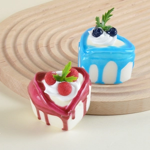 Miniature heart-shaped dessert magnets with faux cream, berries and realistic details