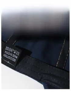 Detailed macro view of the 100% cotton inner sweatband on this navy vintage baseball cap