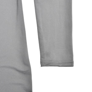 Close-up of grey high-stretch bodysuit sleeve showing premium fabric texture and double stitching