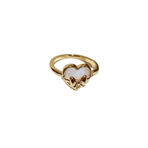Elegant gold open ring featuring a white cat-eye stone heart and pearl flower detail