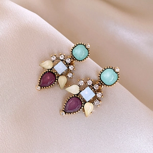 Vintage gold earrings with colorful floral resin teardrops and sparkling rhinestones