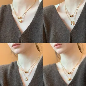 Chic gold-plated titanium steel necklaces with heart and horseshoe charms for layering