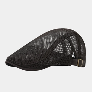 Detail of black mesh ivy cap showing breathable fabric and bronze metal buckle