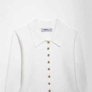 White knit polo cardigan with long sleeves and gold buttons, spring style for women