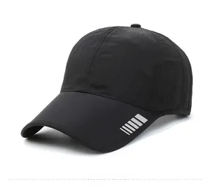 Detail of black baseball cap showing breathable mesh side panels and silver reflective strip