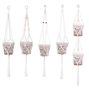 Set of 5 bohemian macrame plant hangers with wooden beads on a clean white background
