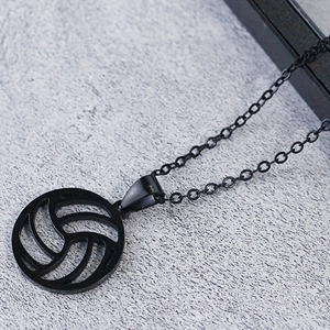 Nahaufnahme des schwarzen Volleyball-Anhängers mit hohlem Design auf strukturiertem Grund