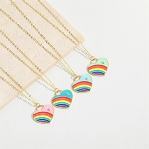 Rainbow heart pendant necklaces in pink, blue, and green on gold chains for women