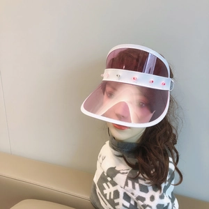 Close-up of pink translucent sun visor with integrated red LED lights and white trim