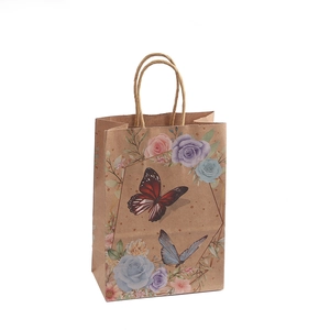 Brown kraft paper gift bag with vintage floral rose and butterfly prints and paper handles