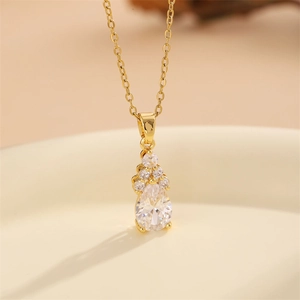 Elegant gold pear-cut cubic zirconia drop necklace with sparkling flower cluster pendant