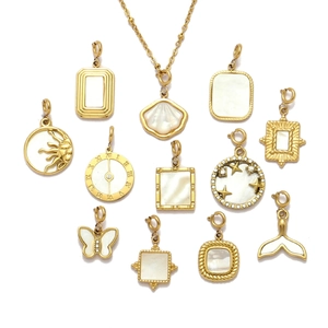 Golden titanium steel necklaces with natural shell pendants in butterfly and sun shapes
