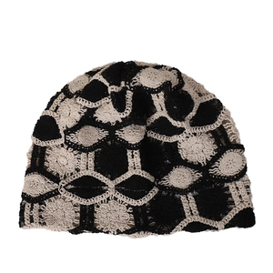 Floral crochet lace slouchy beanie in black and beige contrast for a boho summer style