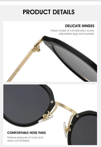 Detail of oval metal sunglasses showing screw hinges and soft silicone nose pads