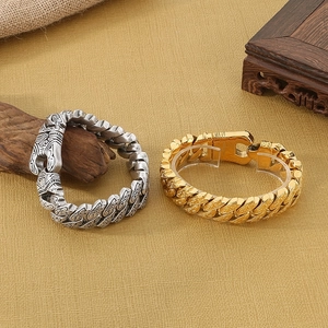Detailed relief patterns on gold and silver vintage stainless steel Cuban link bracelets