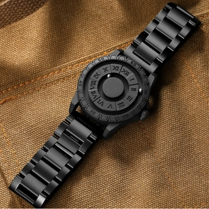 Matte black magnetic ball watch with stainless steel band on a brown canvas background