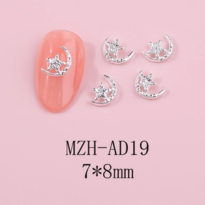 Close-up of 7x8mm silver alloy hollow star nail art charms with sparkling texture detail