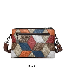 Detail view of the colorful leather shoulder bag back with a functional zipper pocket