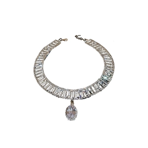 Elegant silver-tone water drop necklace with sparkling zircon crystals on white background