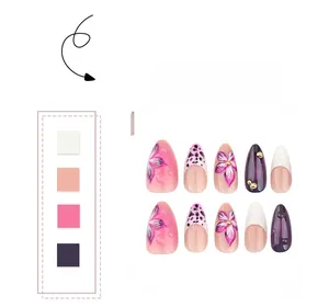 Detail of 3D floral almond press-on nails with pink leopard and white textured patterns