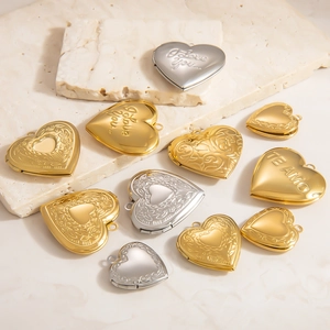 Polished gold and silver heart locket pendants with I Love You and Te Amo engravings