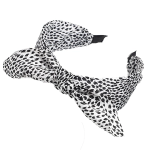 Fashionable leopard print headband with knot bow design in black and white fabric