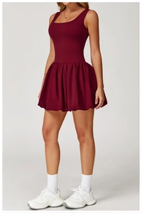 Detail of maroon square neck exercise dress with bubble hem and built-in shorts