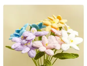 Detailed close-up of handmade crochet flower bouquet showing intricate yarn knitting texture