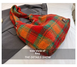 Detail of vintage plaid plush tote bag with autumn pattern and soft fleece texture