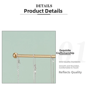 Detailed macro view of 3-tier jewelry rack showing adjustable silver necklace chains
