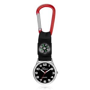 Detail of red metal carabiner, woven nylon strap and integrated compass on the watch