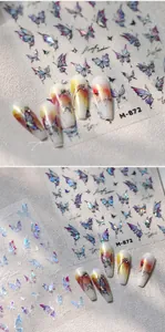 Macro detail of aurora butterfly nail stickers with gold stamping in M-872 and M-875 models