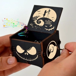 Hand-cranked wooden music box featuring Nightmare Before Christmas laser engravings
