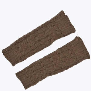Detail shot of dark coffee cable-knit texture on warm winter fingerless arm sleeves