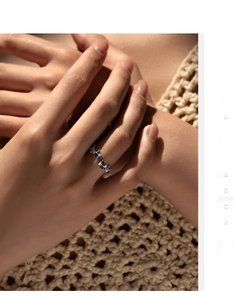 Detail view of S925 silver leaf open ring with marquise blue stones and sparkling diamonds